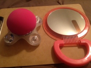 hand-held massager and mirror