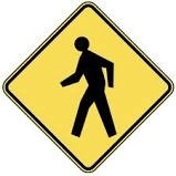 yellow pedestrian crossing sign