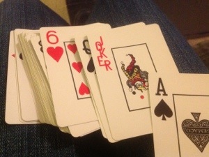 photo of playing cards fanned out on my lap